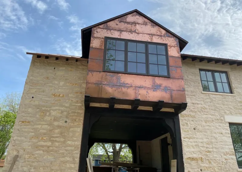 Copper metal panel facade on a stone building for Metal Roof Coating in Los Altos